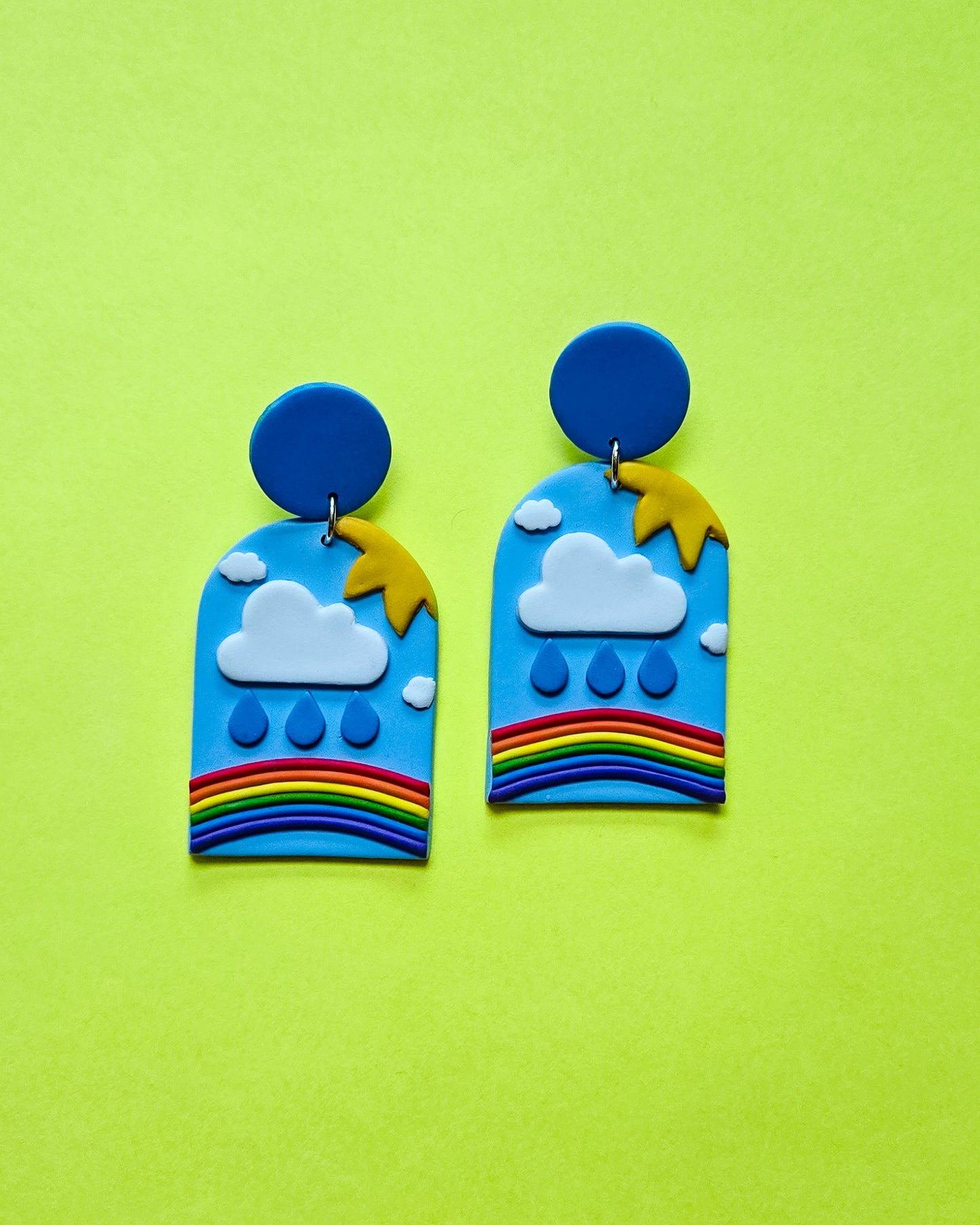 Queer Freedom earrings, pain (rain), confusion (clouds), joy (sun) and liberation (rainbow)