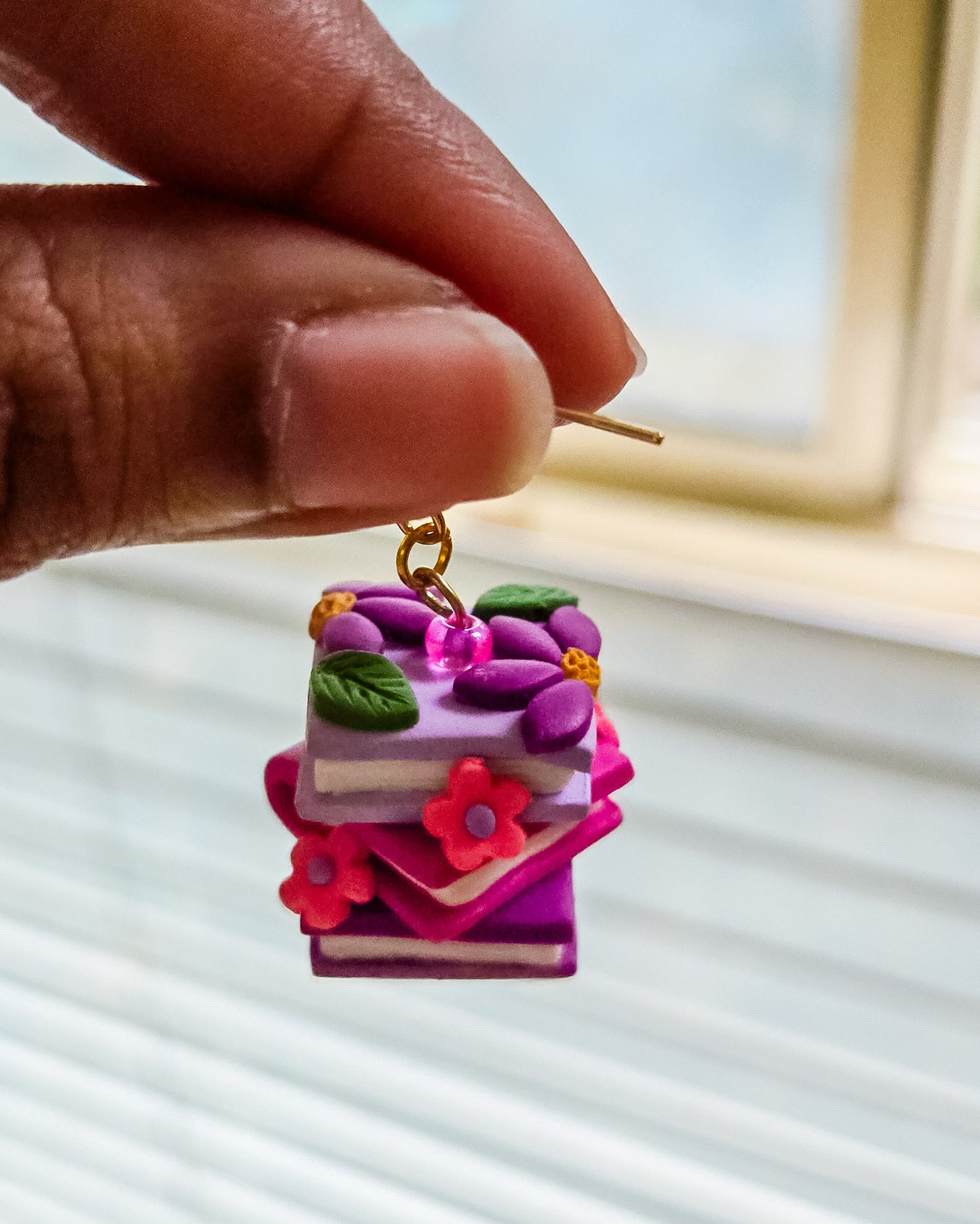 Handsculpted Floral Bookstack earrings with beads